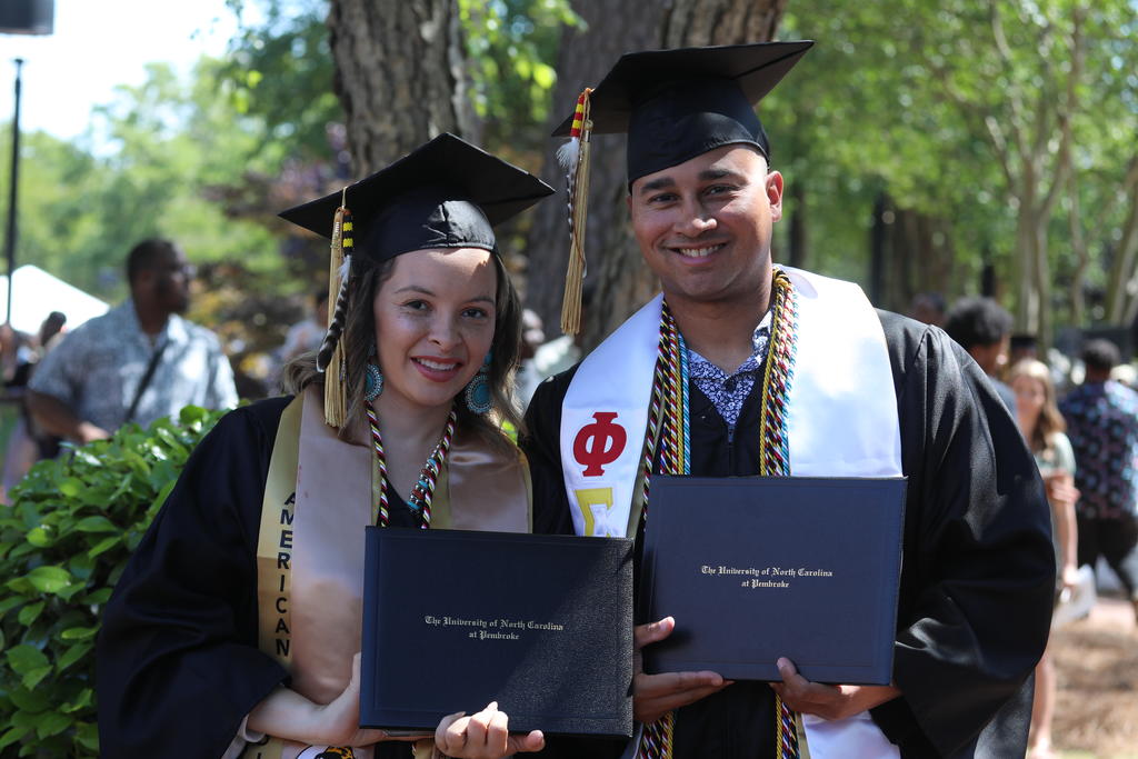 Husband and wife Taylor and Coleman Bartley earned their UNCP degrees on Saturday, May 6, 2023
