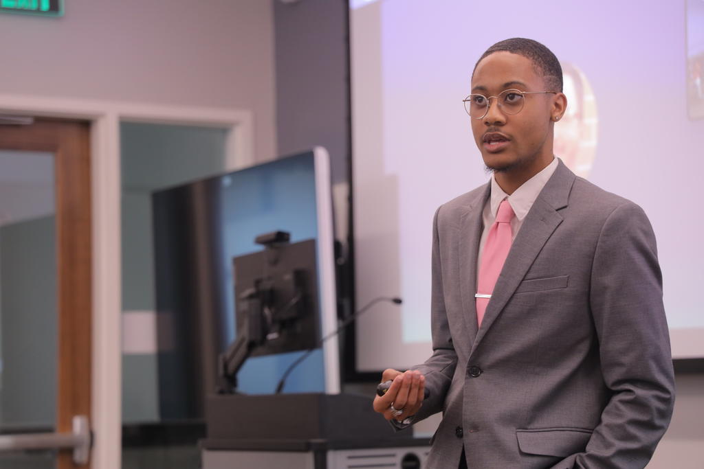 De'Maurion Shelley outlines his research proposal during the Summer Research Exploration program