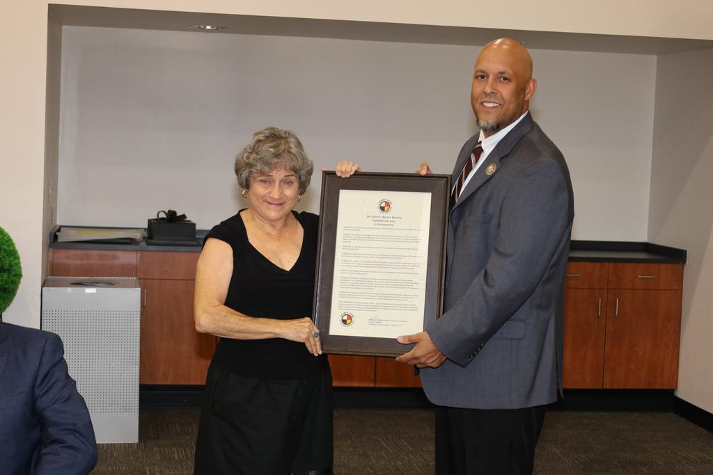 Tribal Chairman John Lowery presents Dr. Beasley with a proclamation for her work over the past five decades to improve the health of citizens across North Carolina and the Lumbee Tribe