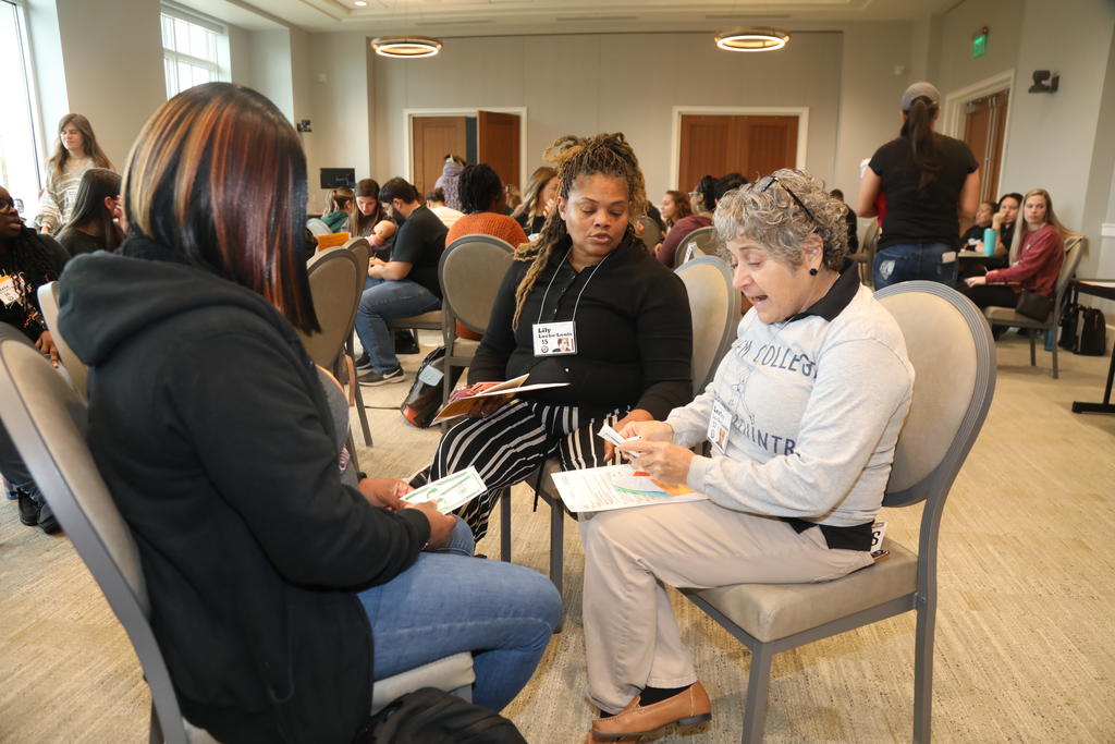 Dr. Cherry Beasley joined student participants during a poverty simulation at James A. Hall