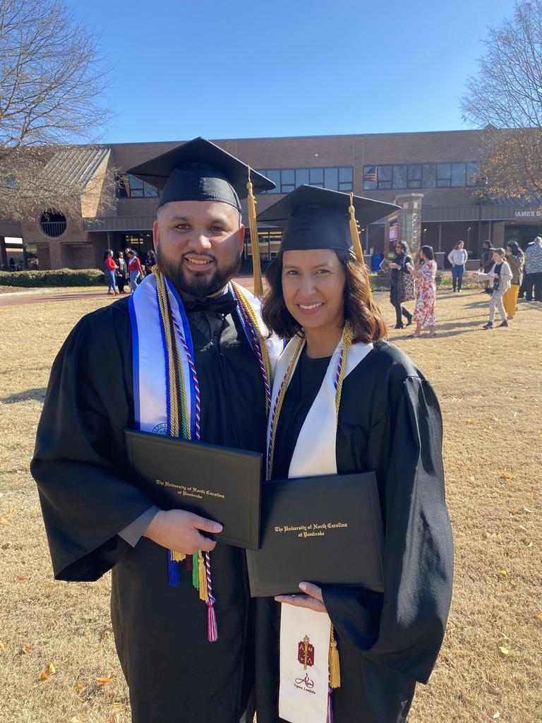 Husband and wife Anthony and Blanca Guerra celebrate their milestone together at Winter Commencement