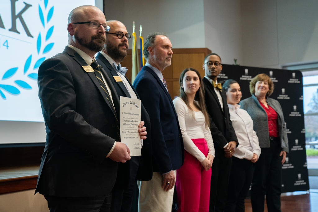 Dr. Kyle Smith (far right) was among the inductees of Omicron Delta Kappa national honor society