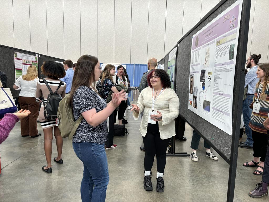 Shannon explains her research poster