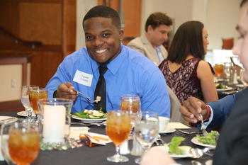 UNC Pembroke Thomas School of Business students participate in an etiquette dinner as part of the Pathways to Professional Success Program.