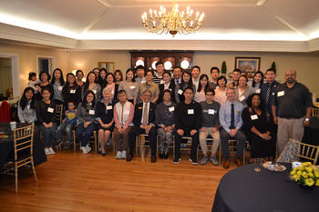 The O’Neal students (seated) pose with several international students at UNCP.
