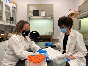 Dr. Karen Farizatto (left) and Jared Tuton review results of protein quantification 