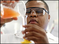 High school students ready for college-level courses study chemistry at UNC Pembroke.