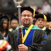 Dr. Bourquin with the University mace.