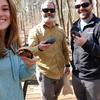 Maria Chavez, Dr. John Roe, and Kristoffer Wild find spotted turtles in the field