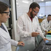 Students at UNC-Pembroke work with chemistry lab equipment. Photo by Willis Glassgow